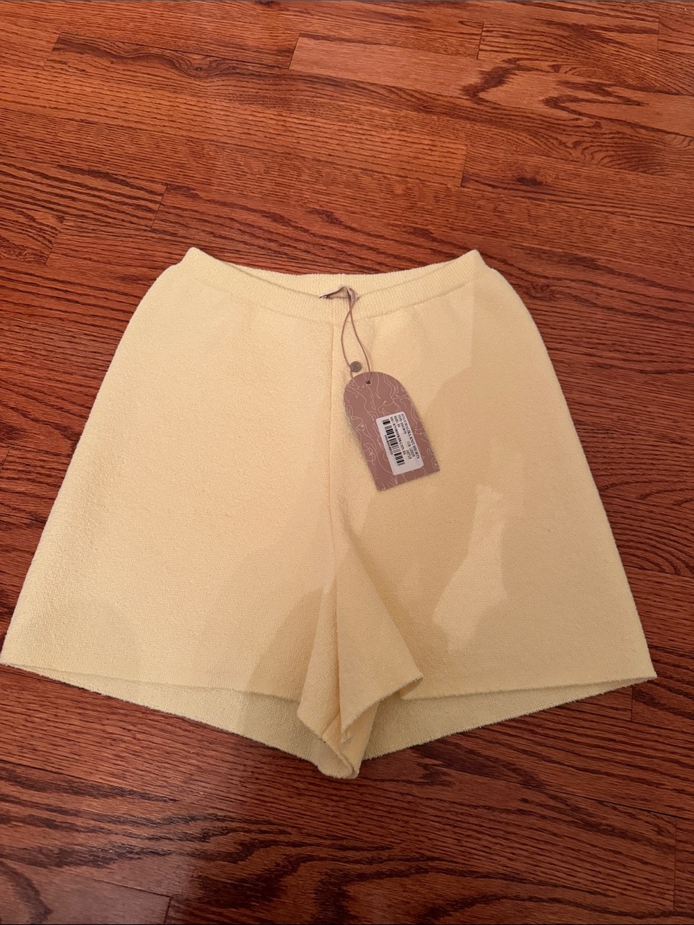 Towel material butter yellow meshki shorts size XS NWT